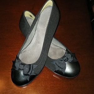 Black flats with a bow